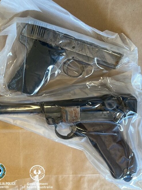 Two of the handguns found at the Morphett Vale home. Picture: South Australia Police