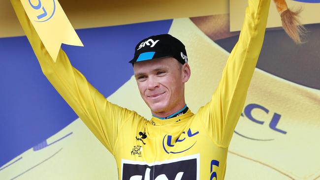 Tour de France - Stage 15 - Mende to Valence. Christopher Froome stands on the podium. Photo Sarah Reed.