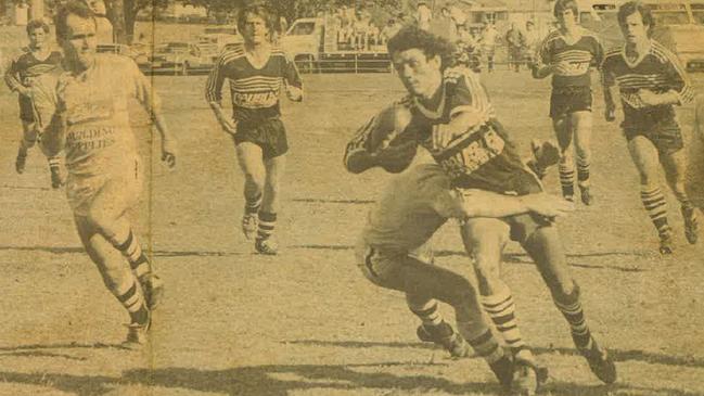 Lower Clarence five-eighth Michael Randall is wrapped up by a Ballina defender in the 1984 Group 1 Rugby League preliminary final win at McKittrick Park, South Grafton.