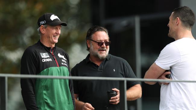 Russell Crowe talks with South Sydney coach Wayne Bennett and former Souths player Luke Burgess. Picture: Brett Costello