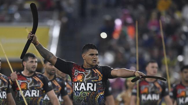 Latrell Mitchell of the Indigenous All Stars leads the 'War Cry' during the NRL All Stars game against the Maori All Stars at Queensland Country Bank Stadium in Townsville in 2021 in Townsville. The match ended in a 10-10 draw. Picture: Ian Hitchcock-Getty Images