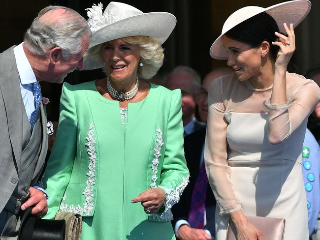 Britain's Prince Charles, Prince of Wales and his wife Camilla, Duchess of Cornwall, talk with Britain's Meghan, Duchess of Sussex. Picture: AFP/Pool/Dominic Lipinski