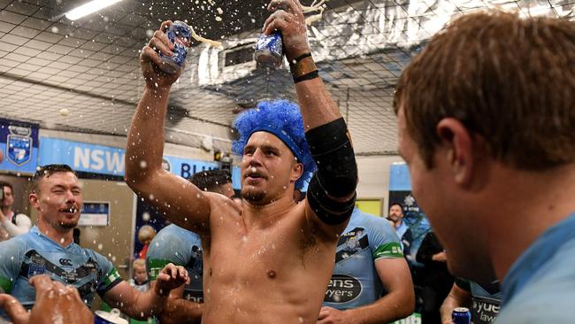 Jack de Belin celebrates the Blues’ series victory. (AAP Image/Dan Himbrechts)