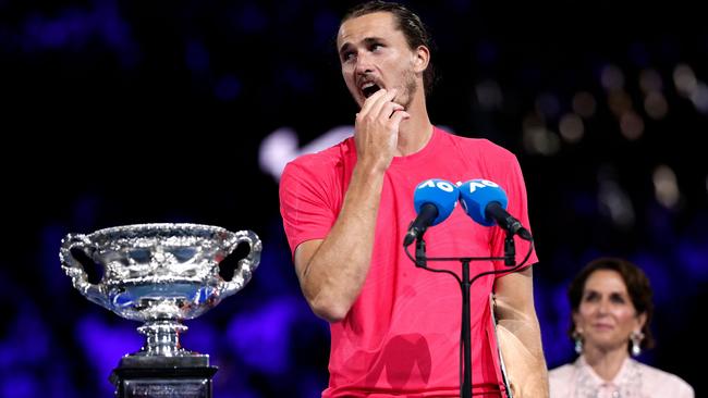 Germany's Alexander Zverev speaks after receiving runners up trophy during a ceremony after his men's singles final match against Italy's Jannik Sinner on day fifteen of the Australian Open tennis tournament in Melbourne on January 26, 2025. (Photo by Martin KEEP / AFP) / -- IMAGE RESTRICTED TO EDITORIAL USE - STRICTLY NO COMMERCIAL USE --