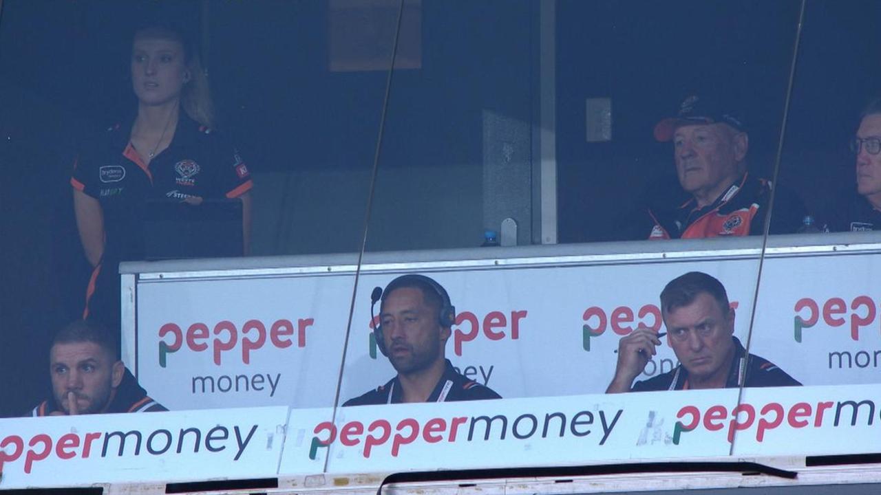 Grant (top left) in the Wests Tigers box in 2023.