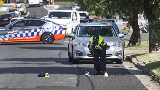 Police at the scene of the fatal hit-and-run. Picture: Richard Dobson