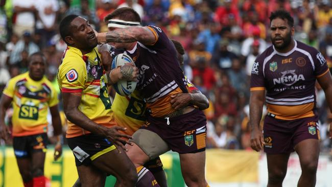 Josh McGuire on the charge for the Broncos against PNG Hunters.