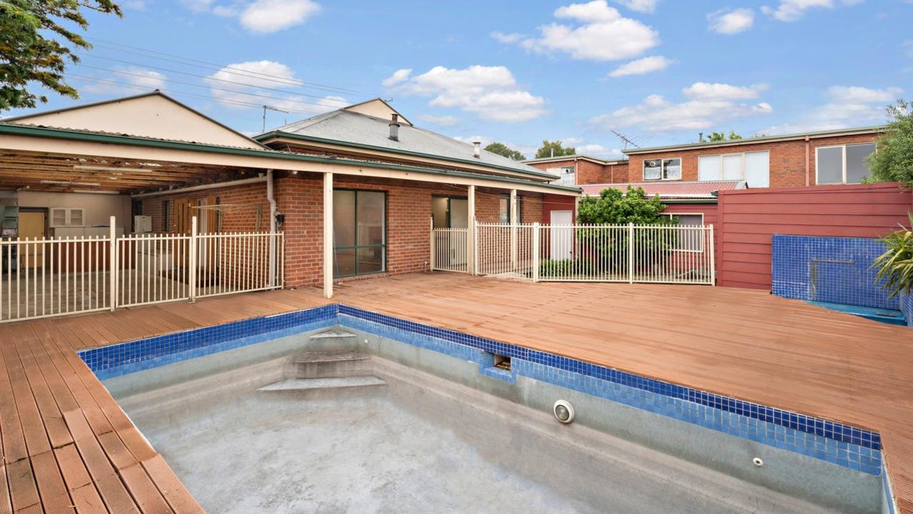 This five-bedroom house is listed with a price guide around Melbourne’s median home price of $792,000 as of November.