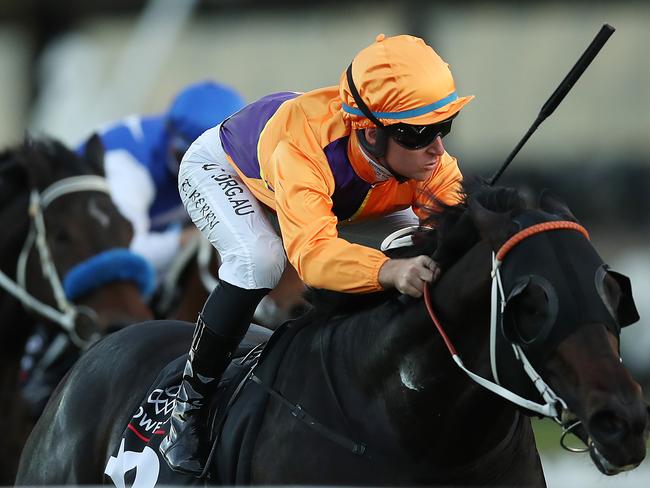 Tommy Berry riding Dirty Work. Picture: Mark Metcalfe/Getty