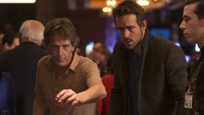 Reynolds (right) and Ben Mendelsohn roll the dice in Mississippi Grind.