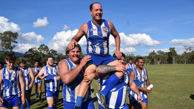 Wayne Clifford is chaired off the field after his 300th game for Brothers Kangaroos.