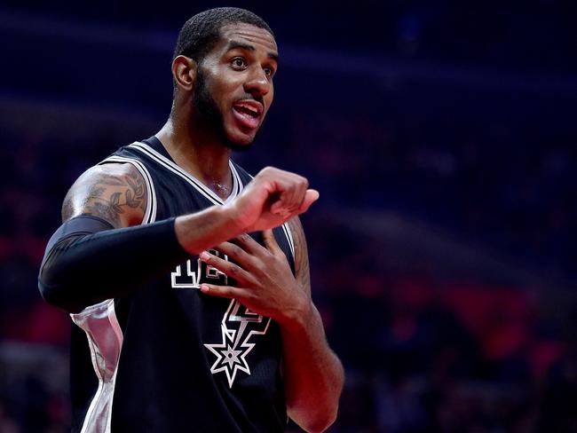 LOS ANGELES, CA - FEBRUARY 24: LaMarcus Aldridge #12 of the San Antonio Spurs reacts to his foul during the first half against the LA Clippers at Staples Center on February 24, 2017 in Los Angeles, California. NOTE TO USER: User expressly acknowledges and agrees that, by downloading and or using this photograph, User is consenting to the terms and conditions of the Getty Images License Agreement.   Harry How/Getty Images/AFP == FOR NEWSPAPERS, INTERNET, TELCOS & TELEVISION USE ONLY ==