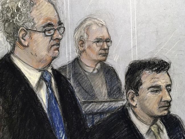 Court artist sketch depicting Julian Assange, centre, in the dock during his extradition hearing in London. Picture: AP