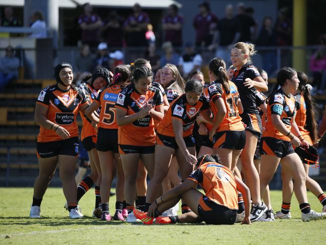 Tigers players celebrate their win. Picture: Warren Gannon Photography