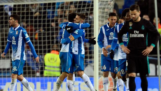 Espanyol's Spanish forward Gerard Moreno (CL) celebrates