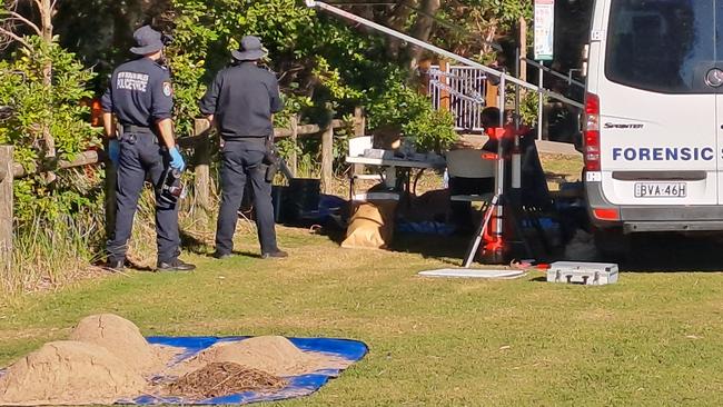 Forensic police at the Coffs Harbour scene where human remains were found on Tuesday. Picture: Toni Moon.