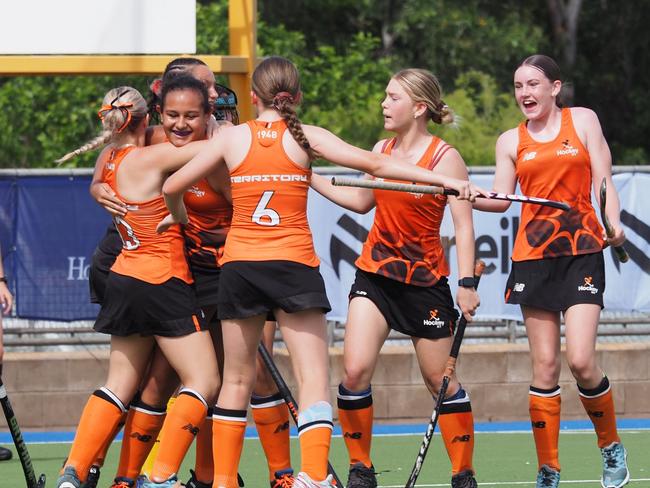 The Northern Territory's Under 15 team celebrates a goal at the national championships in Darwin. Picture: MJM Photography.