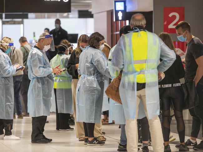 People arriving back from Melbourne after being turned around from Brisbane.Picture:Rob Leeson.