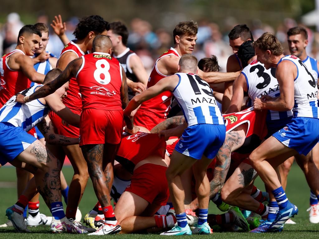 MELBOURNE, AUSTRALIA - MARCH 03: Players remonstrate during the 2024 AFL AAMI Community Series match between the St Kilda Saints and North Melbourne Kangaroos at RSEA Park on March 03, 2024 in Melbourne, Australia. (Photo by Dylan Burns/AFL Photos)