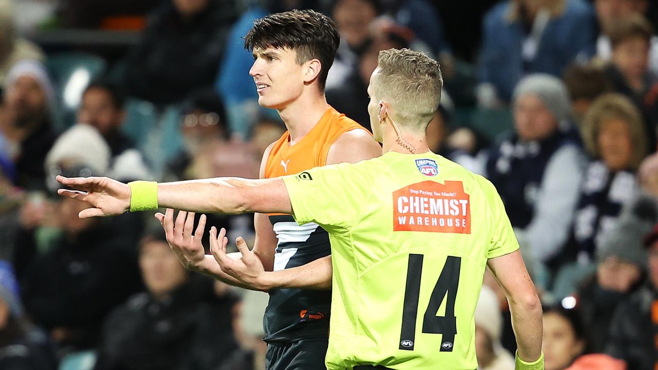 Sam Taylor keeps his emotions in check after giving away a free kick.