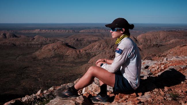 Jacqui Bell enjoying the view at Brinkley Bluff on the Larapinta trail in the Northern Territory. Picture: Chris Huang