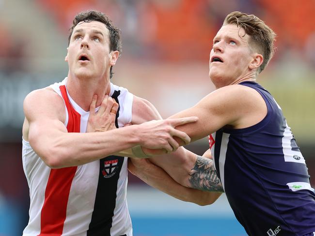 AFL Round 6. St Kilda vs Fremantle at Metricon Stadium, Gold Coast. 11/07/2020. Jake Carlisle of the Saints and Matt Taberner of the Dockers    . Pic: Michael Klein