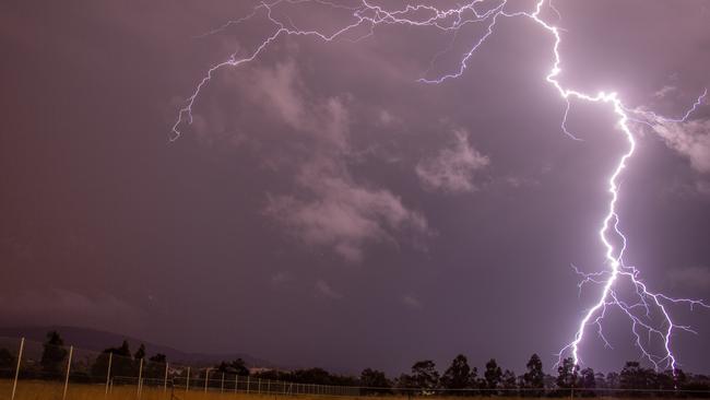 Lightning near Hobart Airport photographed on the morning of January 31, 2019. Picture: Robbie Moles