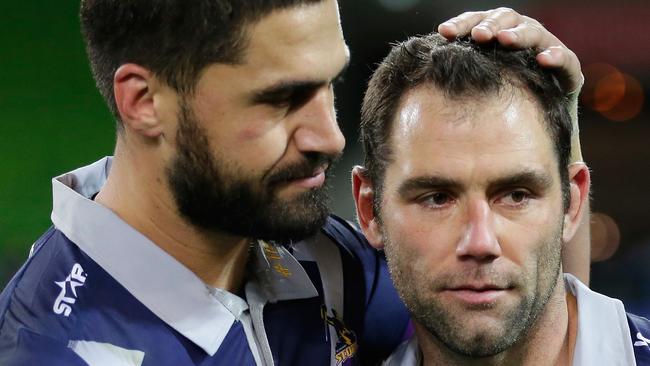 Jesse Bromwich looks up to Cameron Smith.