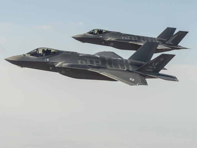 A Royal Australian Air Force F-35A flies in formation with a US Air Force F-35 and F-16 during trial flights from Luke Air Force Base in Phoenix Arizona. *** Local Caption *** Royal Australian Air Force personnel at Luke Air Force Base outside Phoenix, Arizona, USA, from 25 to 27 January 2016, test flying and training on the F-35A Lightning II Joint Strike Fighter (JSF). The JSF program has nine partner countries – Australia, Canada, Denmark, Italy, the Netherlands, Norway, Turkey, the United Kingdom, and the United States (Air Force, Navy and Marine Corps) who will all train together to develop common tactics, techniques and procedures for the operation of the F-35A.