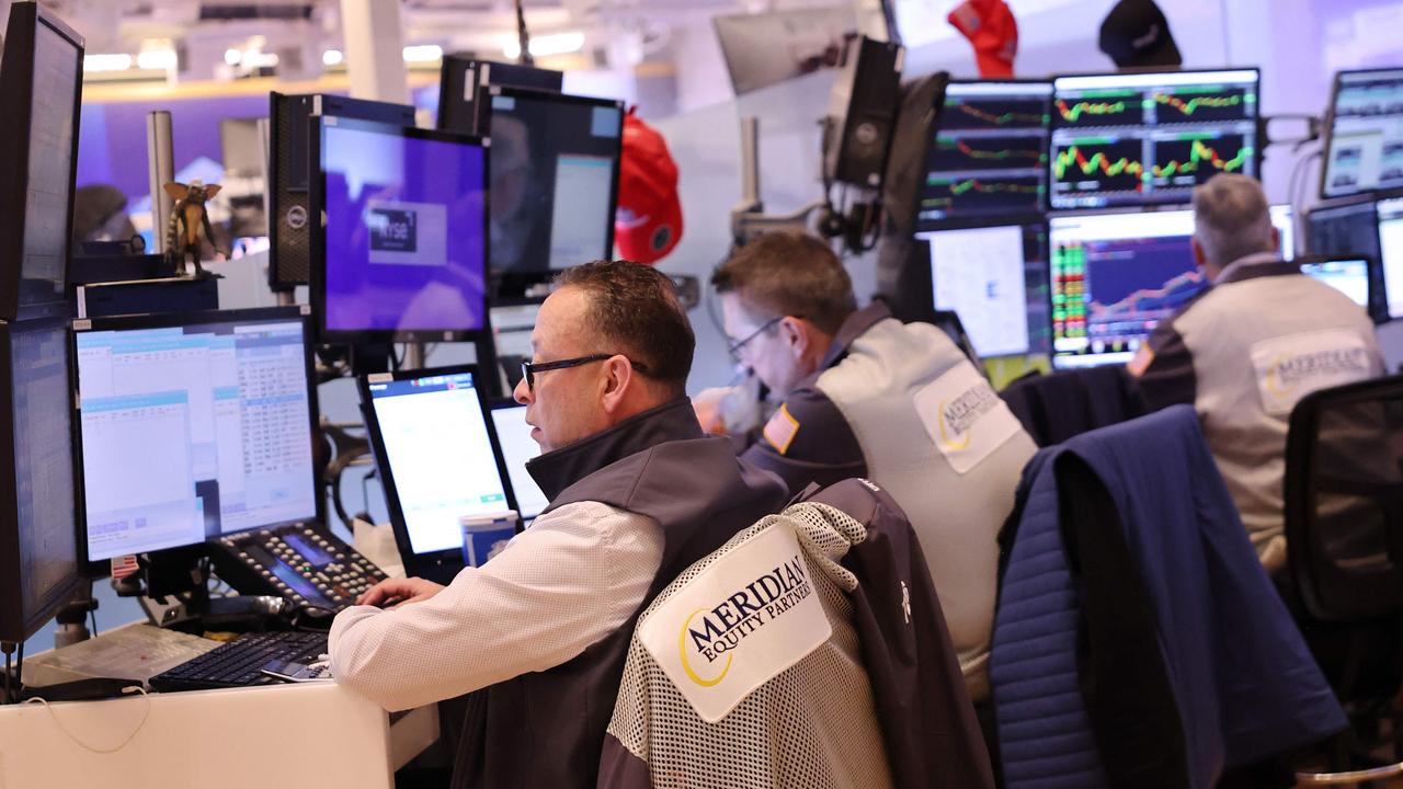 Traders work on the floor of the New York Stock Exchange. Picture: AFP