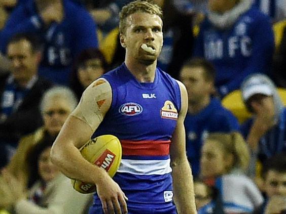 Jake Stringer of the Western Bulldogs kicks a goal during the Round 20 AFL match win between the Western Bulldogs and the North Melbourne Kangaroos at Etihad Stadium in Melbourne, Saturday, Aug. 6, 2016. (AAP Image/Tracey Nearmy) NO ARCHIVING, EDITORIAL USE ONLY