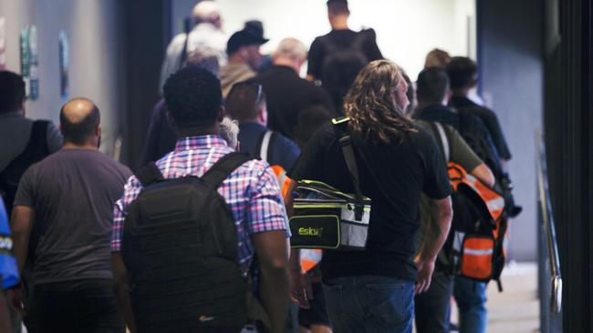 Rail workers entering the meeting at University of South Australia’s City West Campus on Monday. Picture: Emma Brasier.