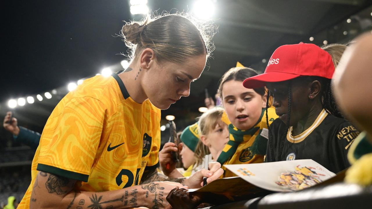 Australia’s Sharn Freier signs autographs during the Matildas v Chinese Taipei friendly in Geelong. Picture: Quinn Rooney/Getty Images.