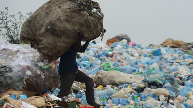 Kenya’s tough plastic bag laws will cost jobs, but the government deems it so important to be worth the cost. (Pic: Simon Maina/AFP)