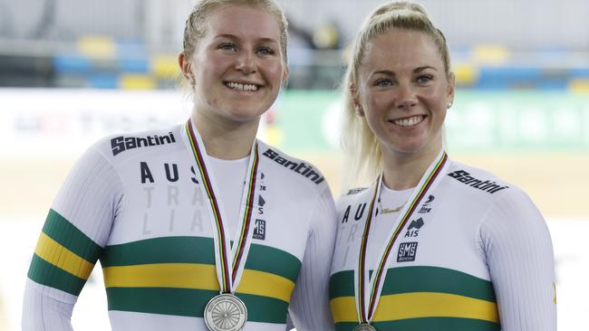 Stephanie Morton and Kaarle Mcculloch celebrate after winning the silver medal in the Women's Team Sprint at the World Track Cycling championships in Hong Kong.