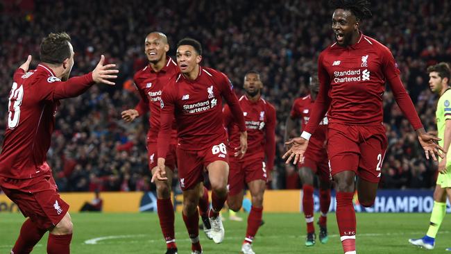 Liverpool's Belgian striker Divock Origi celebrates his team’s fourth goal. Picture: AFP