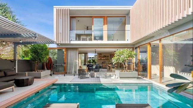 The Sunshine Beach home, completed in March last year with Coral Sea glimpses, set a record for a non-beachfront house in the hamlet.