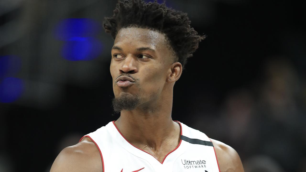 INDIANAPOLIS, INDIANA - JANUARY 08: Jimmy Butler #22 of the Miami Heat gives a kiss to the crowd after receiving a technical foul for an argument with T.J. Warren #1 of the Indiana Pacers during the game at Bankers Life Fieldhouse on January 08, 2020 in Indianapolis, Indiana. NOTE TO USER: User expressly acknowledges and agrees that, by downloading and or using this photograph, User is consenting to the terms and conditions of the Getty Images License Agreement. (Photo by Andy Lyons/Getty Images)