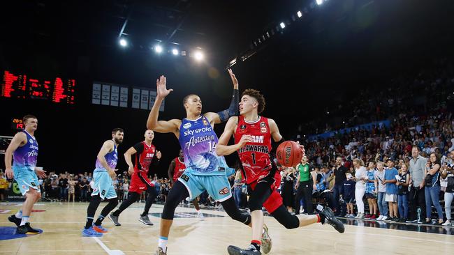 LaMelo Ball drives past fellow NBA draft hopeful RJ Hampton in Illawarra’s recent clash with the New Zealand Breakers Picture: Anthony Au-Yeung/Getty Images