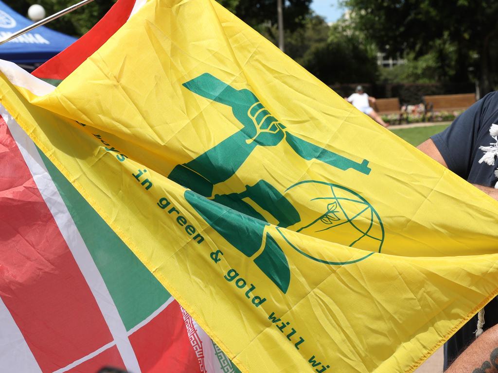 Flags bearing close resemblance to the flag of Lebanese terrorist group Hezbollah were abundant at Sydney’s pro-Palestine protests. Picture: NewsWire / Damian Shaw