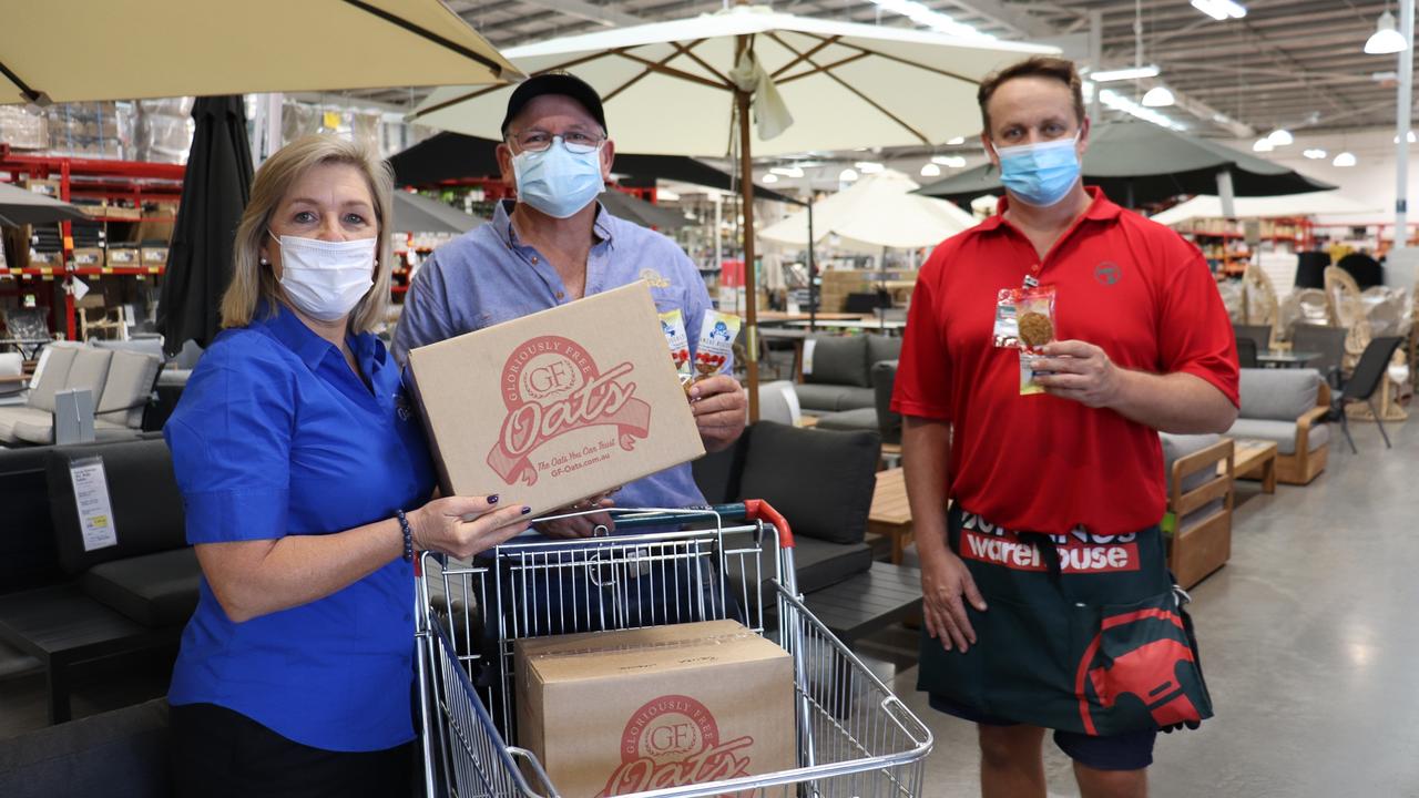 BICKIES FOR BUNNINGS: Toowoomba based, gluten free food manufacturer GF Oats made a special delivery to Bunnings Toowoomba north last week ahead of Anzac Day, dropping 200 packs of their delicious Anzac biscuits off to Bunnings employees across Toowoomba and Warwick. Kylie Martin (left) and Garry McGeorge from GF Oats with Bunnings Operations Manager, Scott Alsop (right).