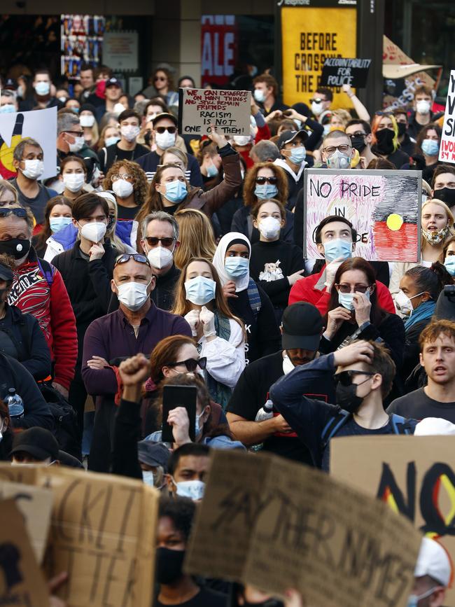 Many of the protesters wore masks. Picture: Sam Ruttyn