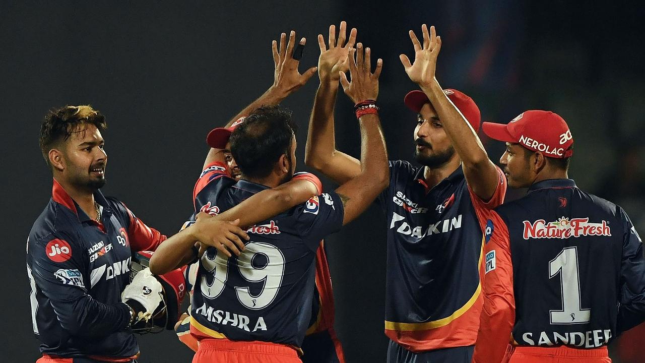 The Delhi Daredevils celebrate the wicket of Hardik Pandya.