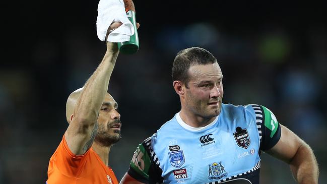 ADELAIDE, AUSTRALIA - NOVEMBER 04: Boyd Cordner of the Blues is assisted by a trainer after a head knock during game one of the 2020 State of Origin series between the Queensland Maroons and the New South Wales Blues at the Adelaide Oval on November 04, 2020 in Adelaide, Australia. (Photo by Mark Kolbe/Getty Images)