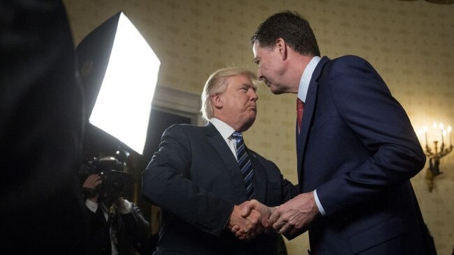 Donald Trump shaking hands with James Comey in 2017. Picture: Andrew Harrer/Bloomberg News/WSJ