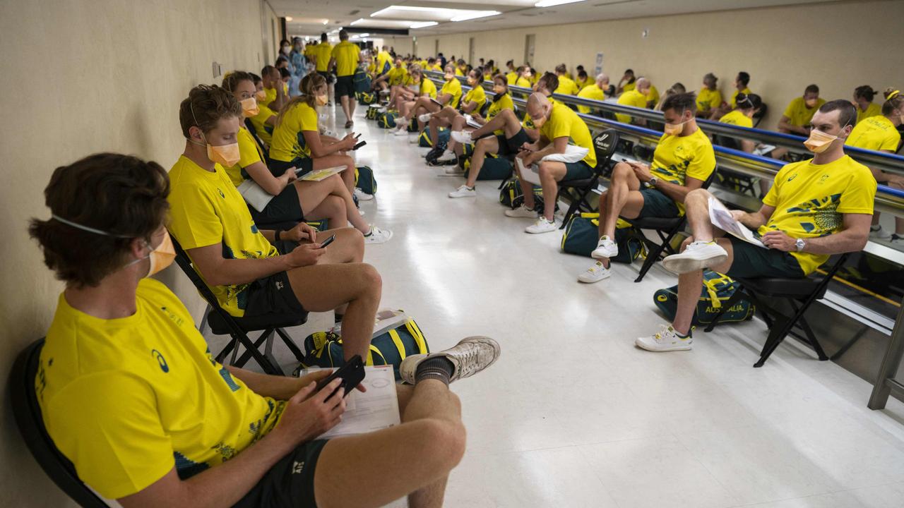 Members of the Australian delegation faced a long wait at Narita International Airport after disembarking. Picture: Charly Triballeau/AFP