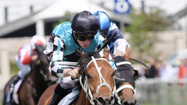 Jockey James McDonald rides Naval Warfare to victory in race 4, the Membership Handicap during Warwick Farm Race Day at Warwick Farm Racecourse in Sydney, Saturday, December 22, 2018. Picture: Simon Bullard/AAP Image