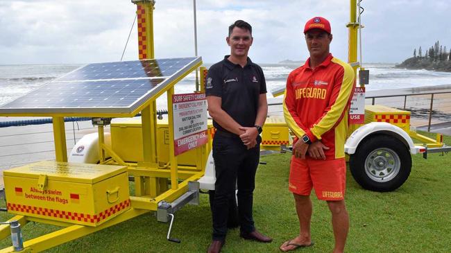 Surf Life Saving Queensland Sunshine Coast lifesaving coordinator Jacob Thomson and Alexandra Headland lifeguard Shane Bevan inspect new emergency beacons installed in March. Picture: Stuart Cumming