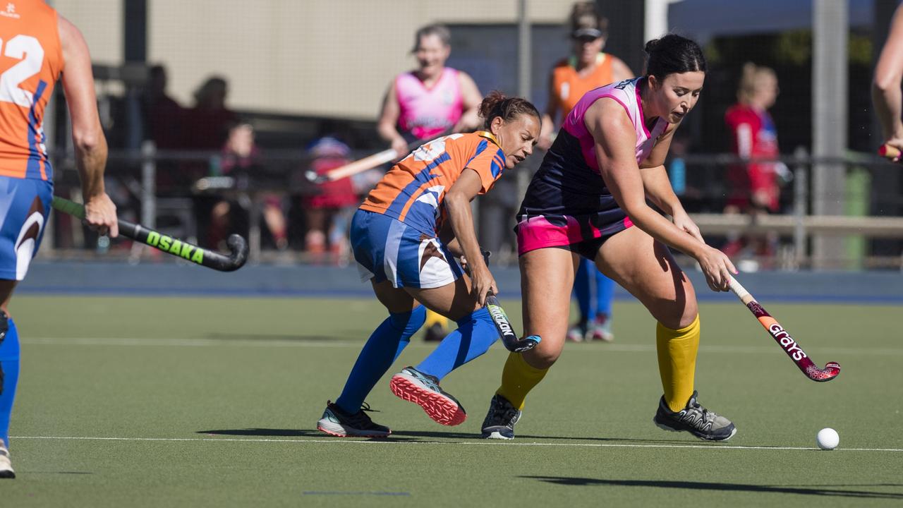 Renee Bidgood (right) of Toowoomba 2 against Maryborough 1.