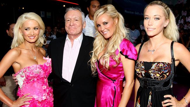 Playmate Holly Madison, pictured with Bridget Marquardt and Kendra Wilkinson, said she cut her hair to set herself apart from the other girls.